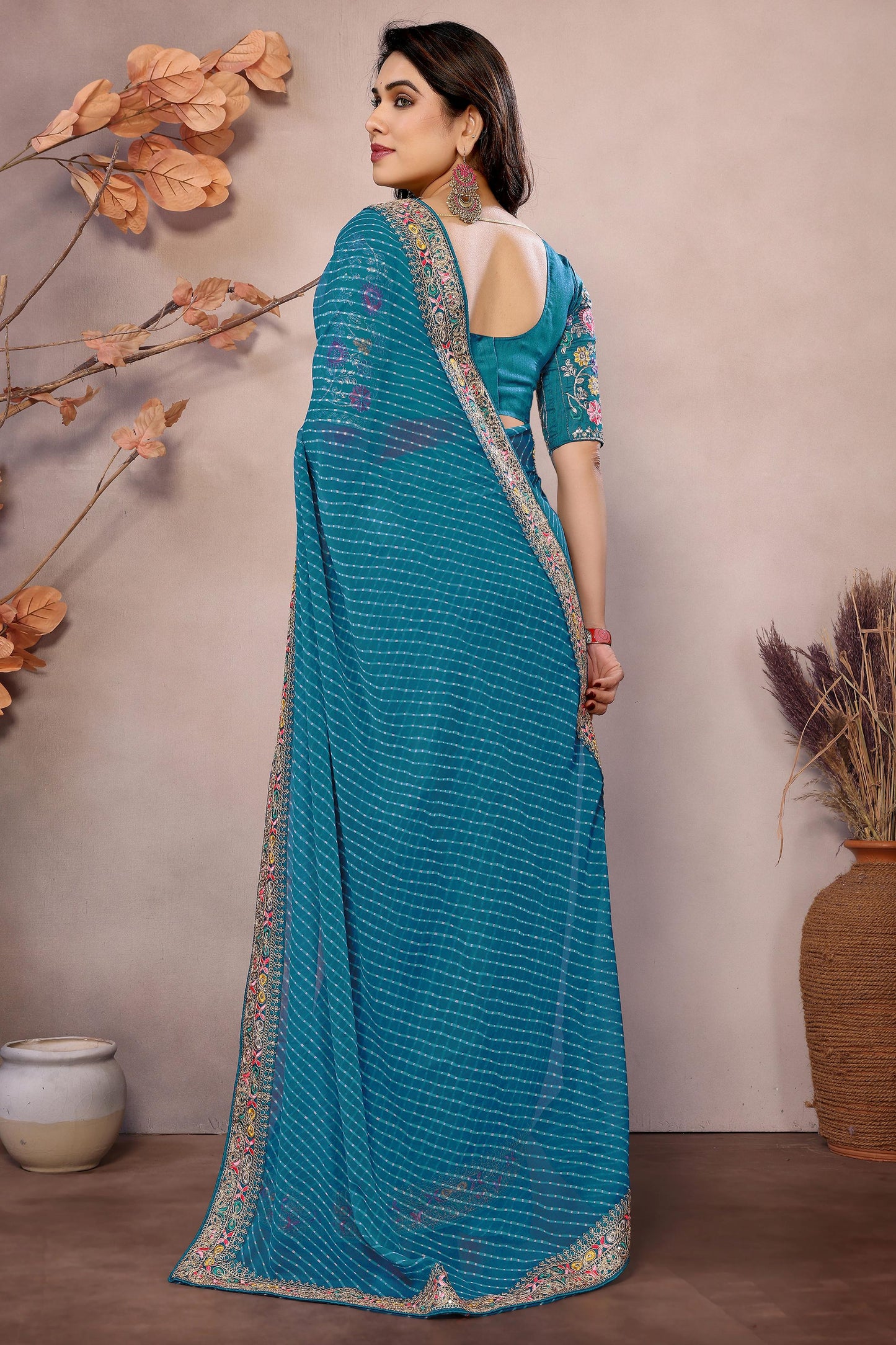 Classy Teal Blue Printed Georgette Wedding Saree With Blouse