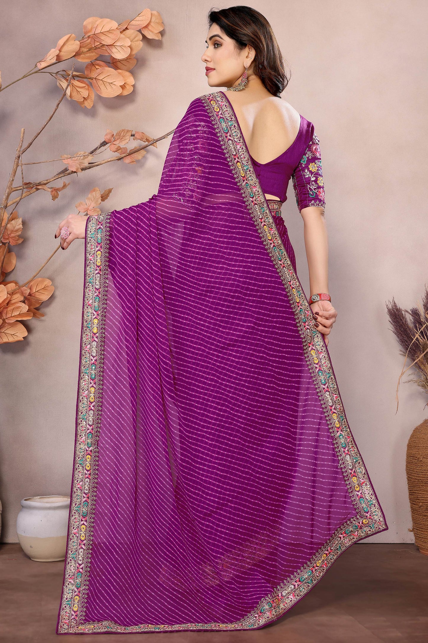 Glamorous Purple Leheriya Printed Georgette Traditional Saree