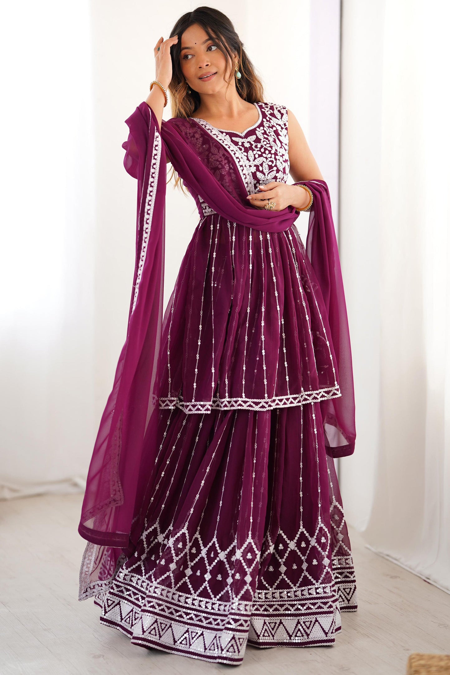 Magnetic Wine Sequins Georgette Wedding Wear Peplum Top Lehenga