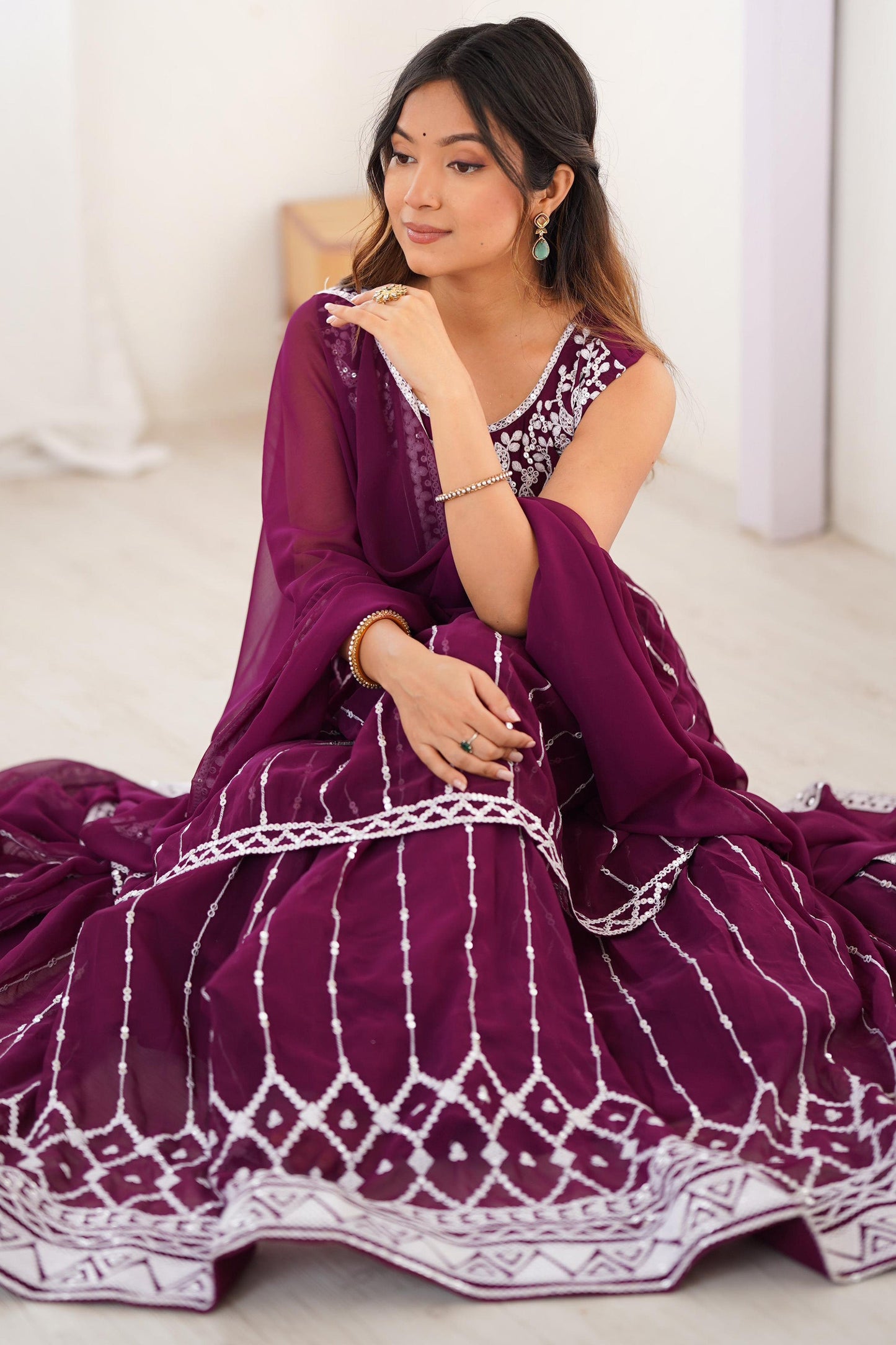Magnetic Wine Sequins Georgette Wedding Wear Peplum Top Lehenga
